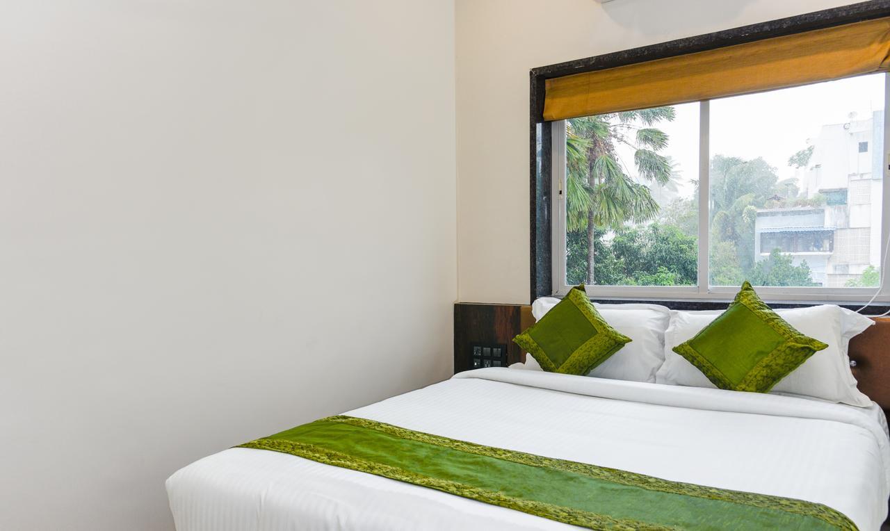 Treebo Malhaar Regency Hotel Chinchvad Eksteriør billede